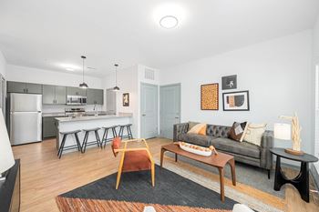 a living room with a couch and a table